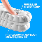 CloudSole insole material compressed by finger, showing soft cushioned foam